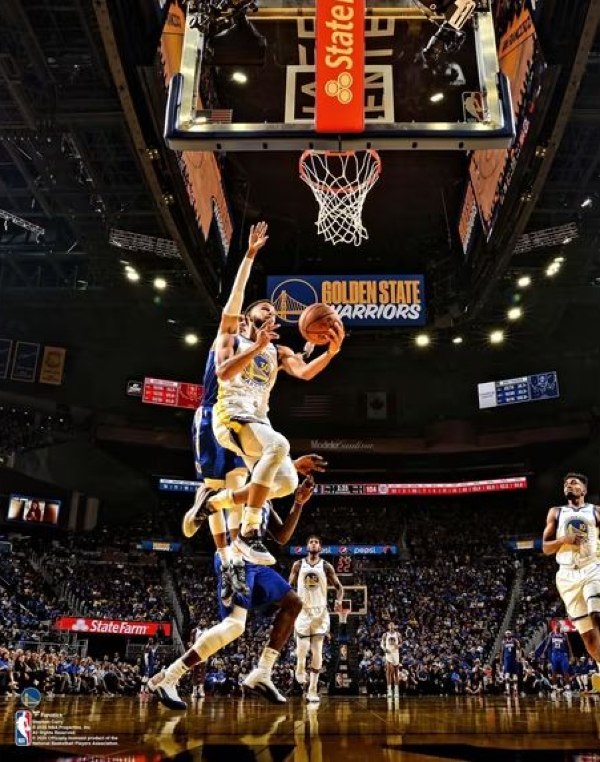 Stephen-Curry-Golden-State-Warriors-Unsigned-Layup-Photograph.webp Stephen Curry Golden State Warriors Layup Photograph